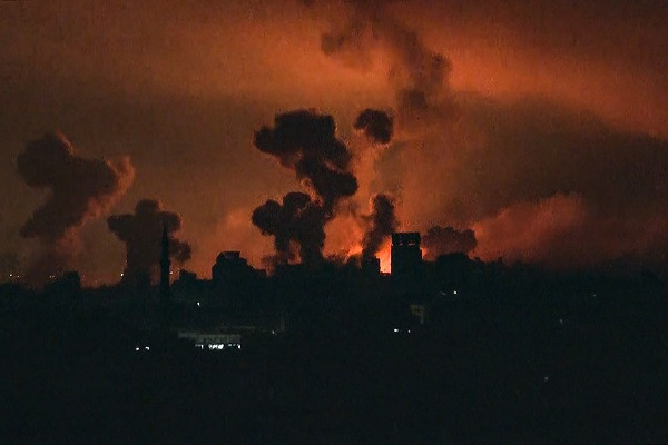 This image grab from an AFP TV footage shows fire and smoke rising above Gaza City during relentless Israeli strikes. PHOTO: AFP