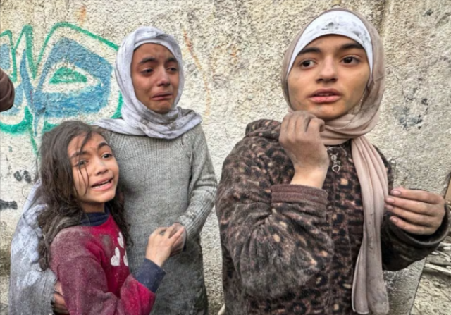 children react following an israeli air strike on palestinian houses photo reuters children react following an israeli air strike on palestinian houses photo reuters