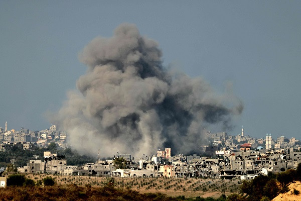 A picture taken from the southern Israeli city of Sderot shows smoke ascending over the northern Gaza Strip following an Israeli airstrike. PHOTO: Reuters