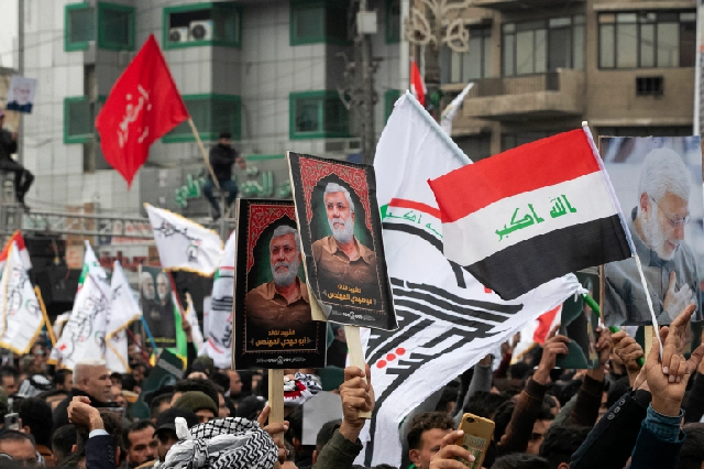 supporters of al hashed al shaabi alliance take part in a symbolic funeral and commemoration of the second anniversary of the us raid that killed qasem soleimani and abu mahdi al muhandis in baghdad on january 1 2022 photo afp supporters of al hashed al shaabi alliance take part in a symbolic funeral and commemoration of the second anniversary of the us raid that killed qasem soleimani and abu mahdi al muhandis in baghdad on january 1 2022 photo afp