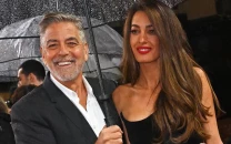 amal clooney s vogue photos spark backlash over heavy editing