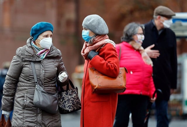 pedestrians are seen as the coronavirus disease covid 19 outbreak continues in mainz germany december 22 2020 photo reuters