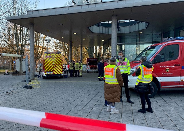 police and firefighters secure the area at the premises of the heidelberg university after a lone gunman wounded several in an attack in a lecture hall in the southwestern university town before shooting himself dead in heidelberg germany january 24 2022 photo reuters