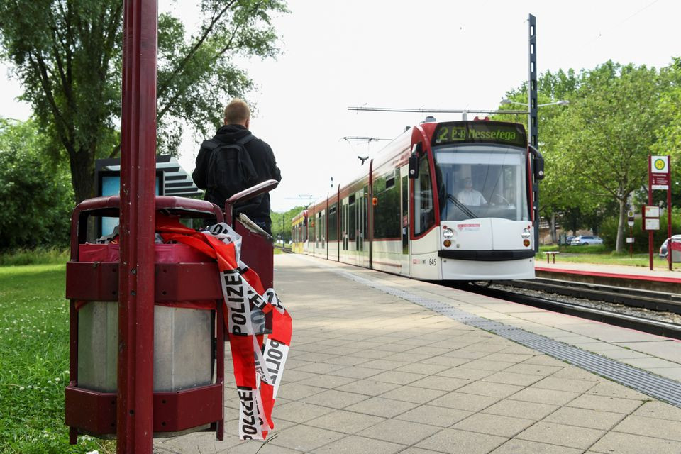 police cordon tape is seen in a garbage can at the faerberwaidweg tram stop where a man attacked passers by with a knife in erfurt germany june 28 2021 photo reuters