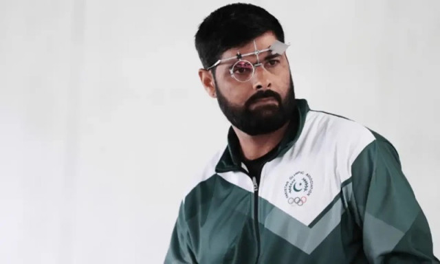 ghulam mustafa bashir competes in the men s 25m rapid fire pistol qualifier photo online ghulam mustafa bashir competes in the men s 25m rapid fire pistol qualifier photo online