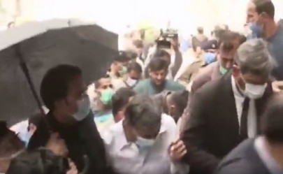 eggs ink hurled at shahbaz gill within lhc premises eggs ink hurled at shahbaz gill within lhc premises