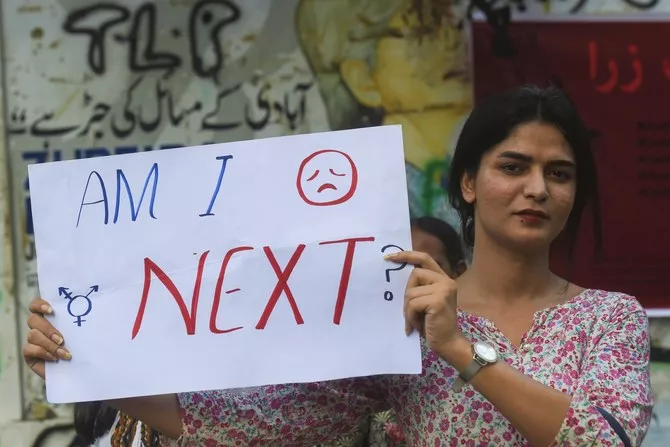 a protestor is seen holding a placard in karachi during a protest against the motorway rape photo afp a protestor is seen holding a placard in karachi during a protest against the motorway rape photo afp
