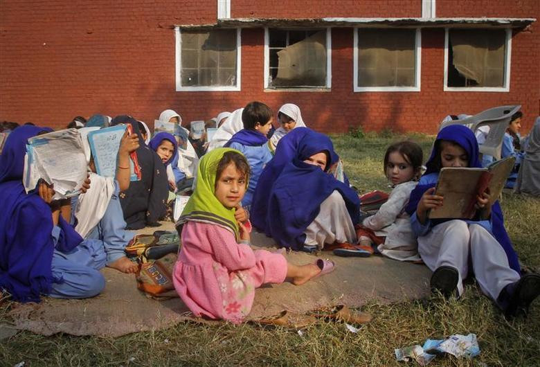 girls attend a lesson outside a damaged classroom at government girls primary school no 3 which was bombed by suspected militants in swabi located in pakistan s khyber pakhtunkhwa province november 15 2011 reuters faisal mahmood