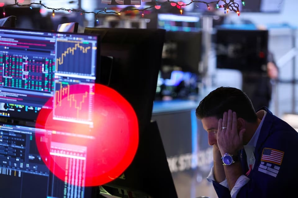 a trader works on the trading floor at the new york stock exchange in new york city us december 14 2022 file photo reuters