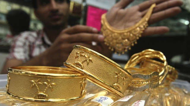 Gold hits new peak