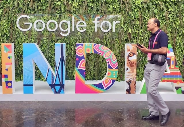 a man walks past the sign of google for india the company s annual technology event in new delhi india september 19 2019 photo reuters