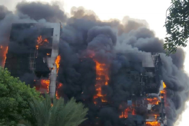 a fire rips through the greater nile petroleum oil company tower in khartoum as battles between sudanese rival forces rages in khartoum photo afp a fire rips through the greater nile petroleum oil company tower in khartoum as battles between sudanese rival forces rages in khartoum photo afp