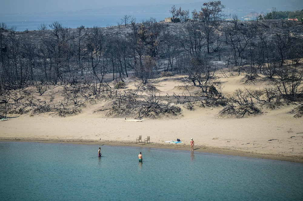 Heatwaves, droughts and wildfires struck Asia, Europe and North America over the last three months. PHOTO: AFP