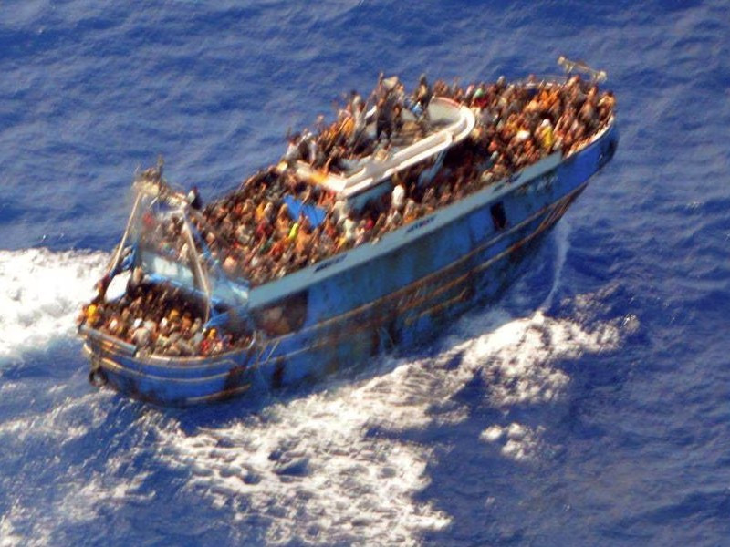 a undated handout photo provided by the hellenic coast guard shows migrants onboard a boat during a rescue operation before their boat capsized on the open sea off greece june 14 2023 photo reuters