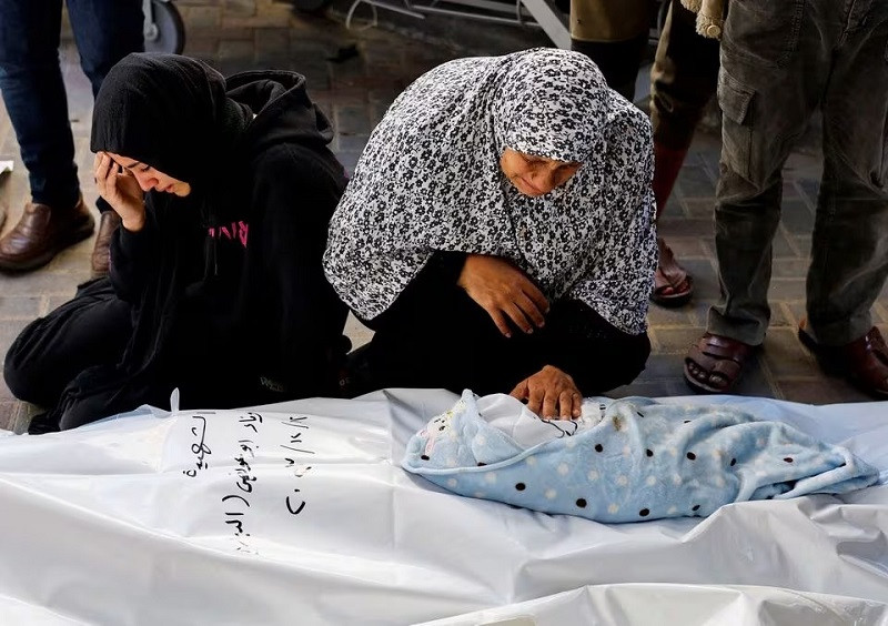 the grandmother of palestinian baby idres al dbari who was killed in an israeli strike at abu yousef al najjar hospital in rafah in the southern gaza strip december 12 2023 photo reuters