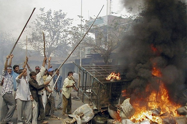 Photo of Gujarat massacre: Protests after 'chilling' arrest of India rights activist
