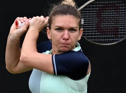 suspended halep charged with second doping breach