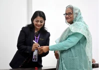 an officer puts an ink mark on the thumb of sheikh hasina prime minister of bangladesh and chairperson of bangladesh awami league at the dhaka city college center during the 12th general election in dhaka bangladesh january 7 2024 photo reuters