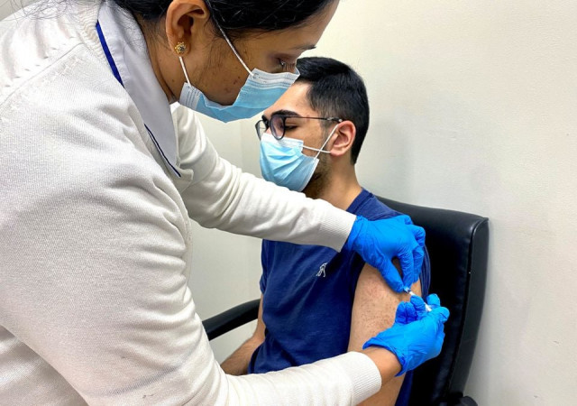a man receives a dose of a vaccine against the coronavirus disease covid 19 in dubai united arab emirates december 28 2020 reuters a man receives a dose of a vaccine against the coronavirus disease covid 19 in dubai united arab emirates december 28 2020 reuters