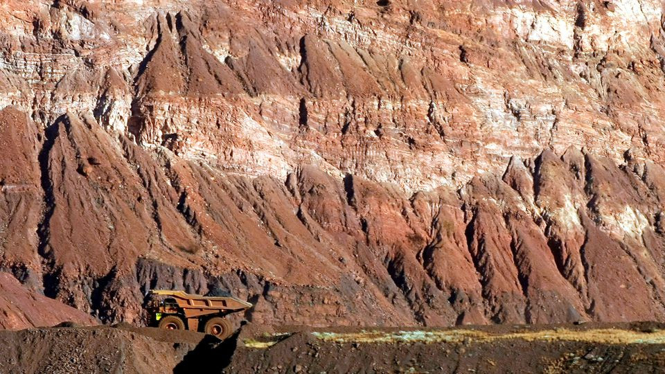 a tipper truck drives on a road through a bhp billition iron ore mine at newman about 1 300 km 800 miles north of perth may 28 2008 picture taken may 28 2008 photo reuters