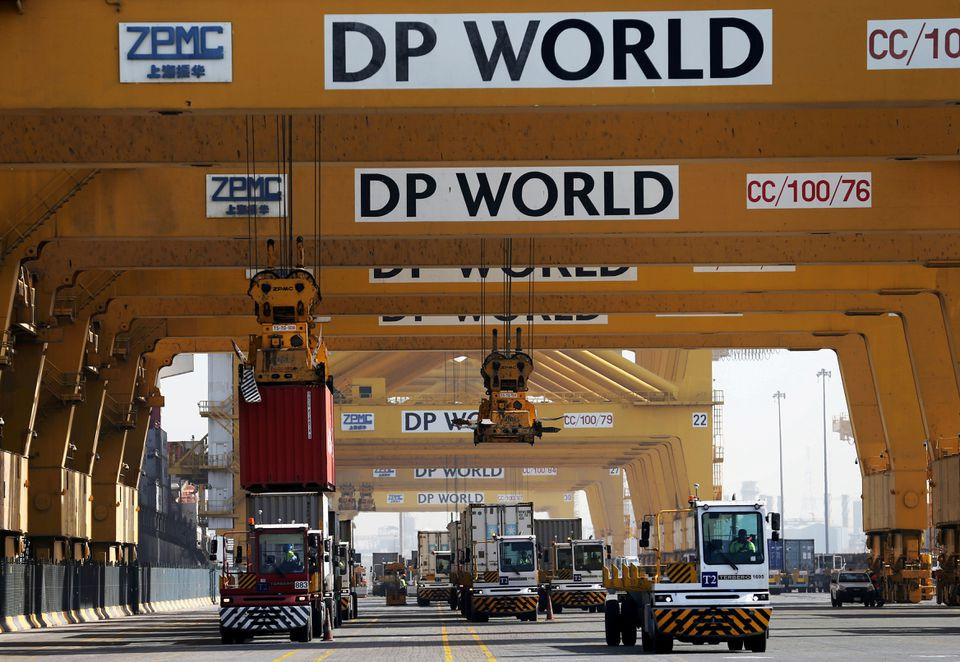 terminal tractors line up to load containers into a cargo ship at dp world s fully automated terminal 2 at jebel ali port in dubai united arab emirates december 27 2018 photo reuters file