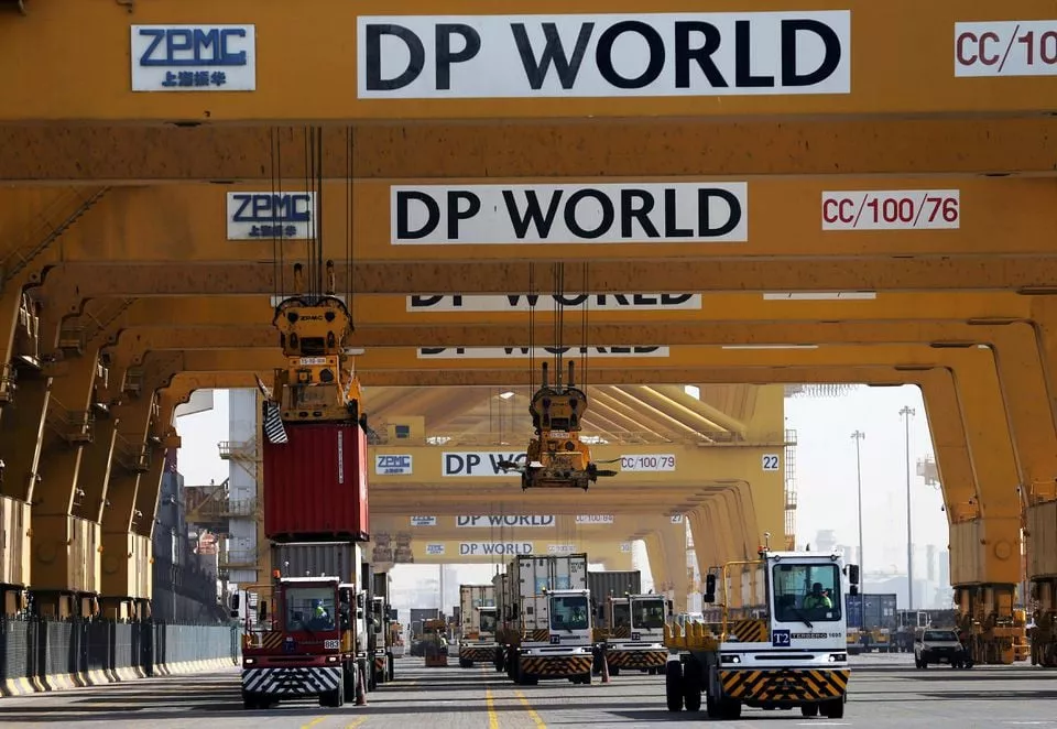 terminal tractors line up to load containers into a cargo ship at dp world s fully automated terminal 2 at jebel ali port in dubai united arab emirates december 27 2018 photo reuters file terminal tractors line up to load containers into a cargo ship at dp world s fully automated terminal 2 at jebel ali port in dubai united arab emirates december 27 2018 photo reuters file