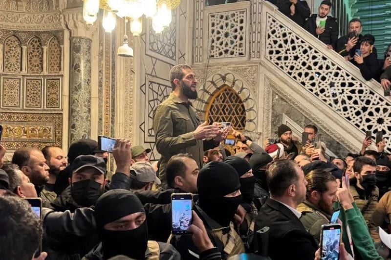 hayat tahrir al sham leader abu mohammed al julani speaks to a crowd at ummayad mosque in damascus after syrian rebels announced that they had ousted president bashar al assad on december 8 2024 photo reuters