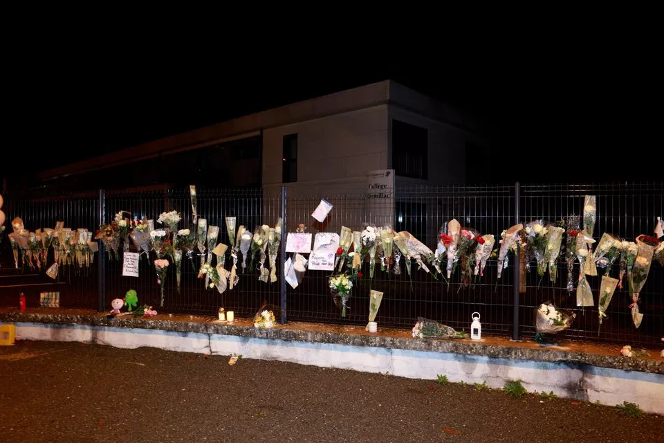 flowers notes and toys are displayed in front of a school following the rape and murder of a 14 year old girl in tonneins france november 21 2022 reuters flowers notes and toys are displayed in front of a school following the rape and murder of a 14 year old girl in tonneins france november 21 2022 reuters