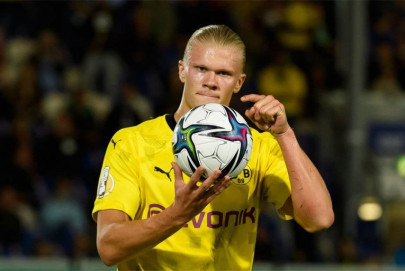 haaland hits hat trick as holders dortmund march on in german cup haaland hits hat trick as holders dortmund march on in german cup