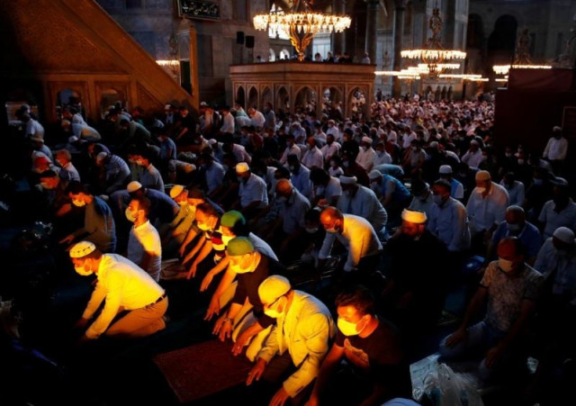 worshippers attend afternoon prayers and visit hagia sophia grand mosque for the first time after it was once again declared a mosque after 86 years in istanbul turkey photo reuters worshippers attend afternoon prayers and visit hagia sophia grand mosque for the first time after it was once again declared a mosque after 86 years in istanbul turkey photo reuters