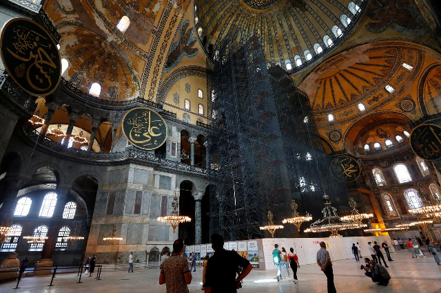 outside prayers hagia sophia will be open to all visitors and tourists and all mosaics will be uncovered authorities have said photo reuters