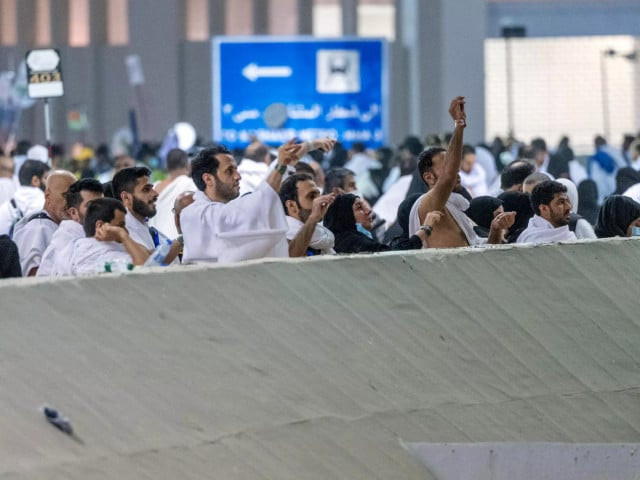 muslim pilgrims hurl stones at three concrete blocks representing the devil photo afp muslim pilgrims hurl stones at three concrete blocks representing the devil photo afp