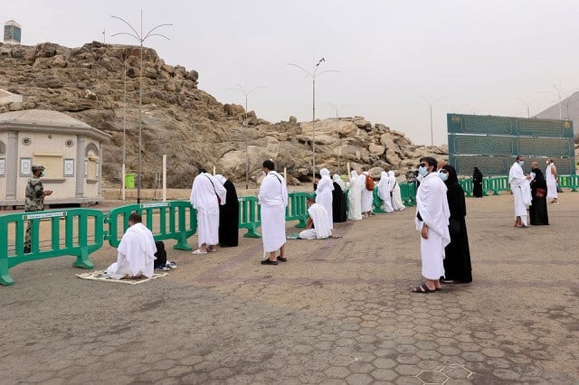 Muslim pilgrims gather at the plain of Arafat during the annual Haj pilgrimage, outside the holy city of Mecca, Saudi Arabia July 19, 2021. PHOTO: REUTERS