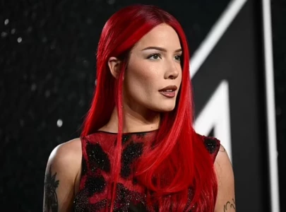 halsey treated in hospital after boston concert but confirms she will continue performing
