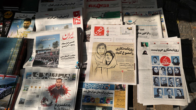 an october 2022 edition of the ham mihan newspaper centre reporting on the detention of journalist elahe mohammadi whose sister elnaz has also been sentenced to jail time photo afp