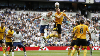 kane s landmark goal fires spurs to victory