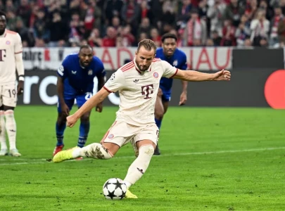 kane breaks record with four goals in bayern s 9 2 champions league win