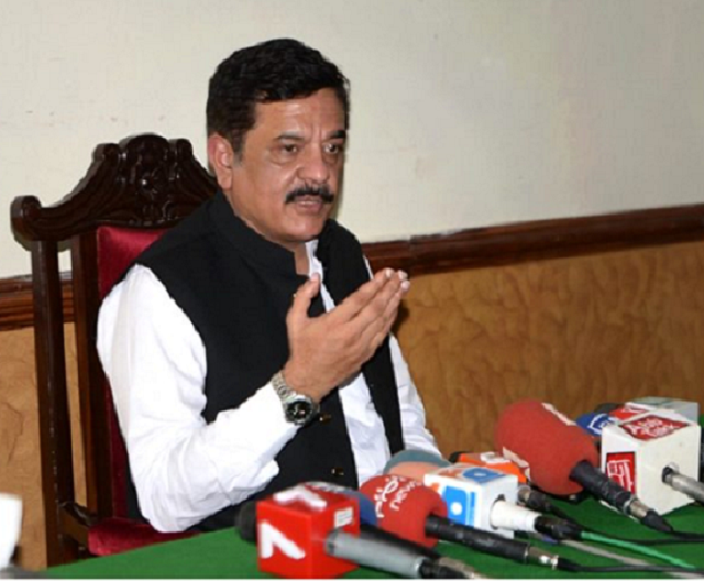 provincial interior minister col r muhammad hashim dogar is addressing a press conference at circuit house photo app file