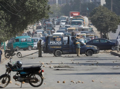 five motorcycles set ablaze as commuters protestors clash near karachi s drigh road