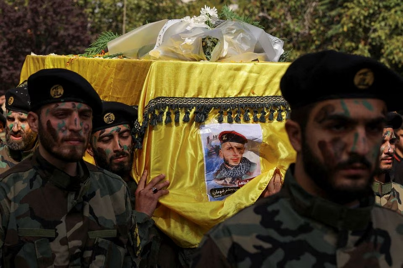 Members of Hezbollah carry the coffin of Hezbollah member Abbas Shuman, who was killed in southern Lebanon, during his funeral, in Baalbek, Lebanon, October 23. PHOTO: REUTERS