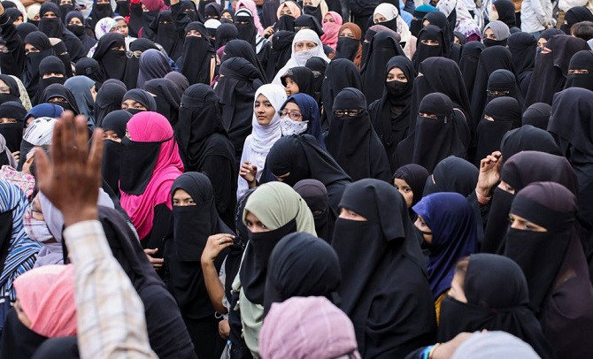 women wearing hijabs attend a protest against the recent hijab ban in few colleges of karnataka state on the outskirts of mumbai india february 13 2022 photo reuters
