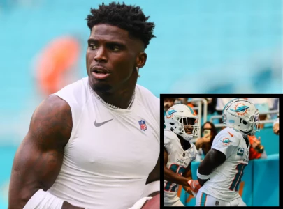 tyreek hill mimics police handcuffing after detainment in dolphins season opener celebration