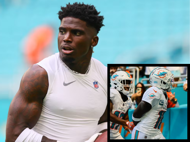tyreek hill mimics police handcuffing after detainment in dolphins season opener celebration tyreek hill mimics police handcuffing after detainment in dolphins season opener celebration