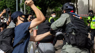 man suspected of stabbing hong kong officer arrested on flight man suspected of stabbing hong kong officer arrested on flight