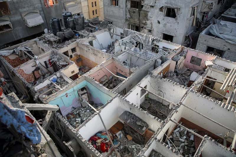 Houses shop-worn in an Israeli strike are seen, in Rafah, in a southern Gaza Strip, May 7. PHOTO: REUTERS