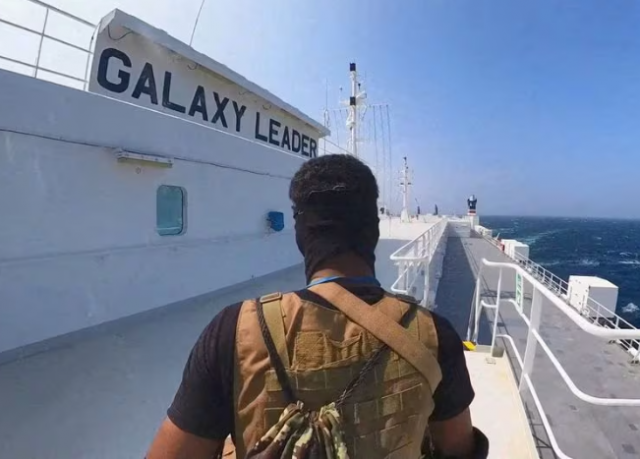 a houthi fighter stands on the galaxy leader cargo ship in the red sea in this photo released november 20 2023 a houthi fighter stands on the galaxy leader cargo ship in the red sea in this photo released november 20 2023
