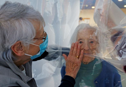 cuddling in covd hug bubble lets seniors feel the magic of touch cuddling in covd hug bubble lets seniors feel the magic of touch