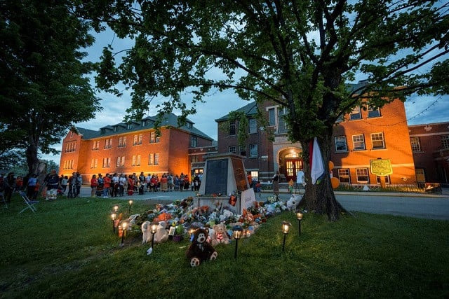 kamloops residents and first nations people gather to listen to drummers and singers at a memorial in front of the former kamloops indian residential school after the remains of 215 children some as young as three years old were found at the site last week in kamloops british columbia canada may 31 2021 photo reuters kamloops residents and first nations people gather to listen to drummers and singers at a memorial in front of the former kamloops indian residential school after the remains of 215 children some as young as three years old were found at the site last week in kamloops british columbia canada may 31 2021 photo reuters