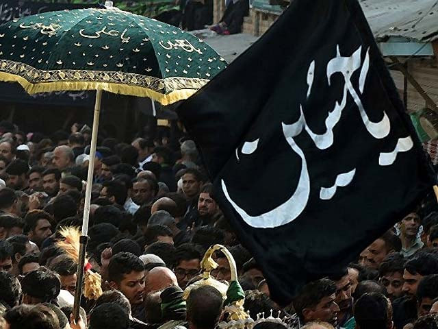 kashmiri shiite muslims during a religious procession in srinagar photo afp