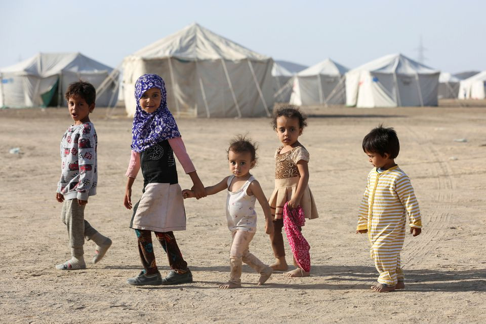file photo children walk at a camp for people recently displaced by fighting in yemen s northern province of al jawf between government forces and houthis in marib yemen march 8 2020 picture taken march 8 2020 photo reuters